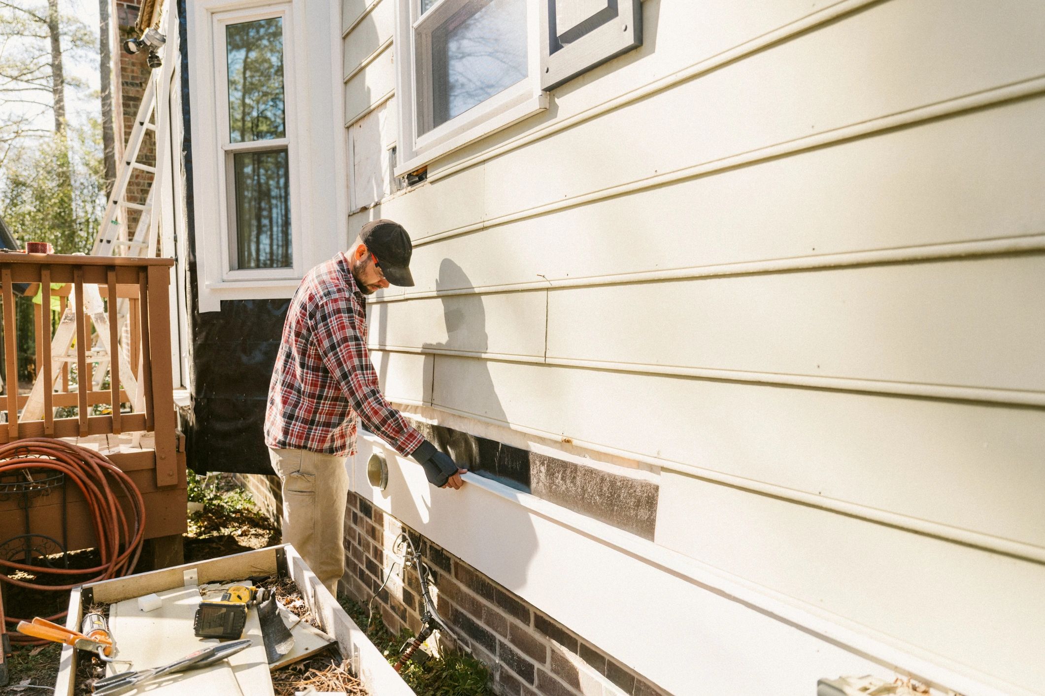Technician carrying out repair work at a residential property